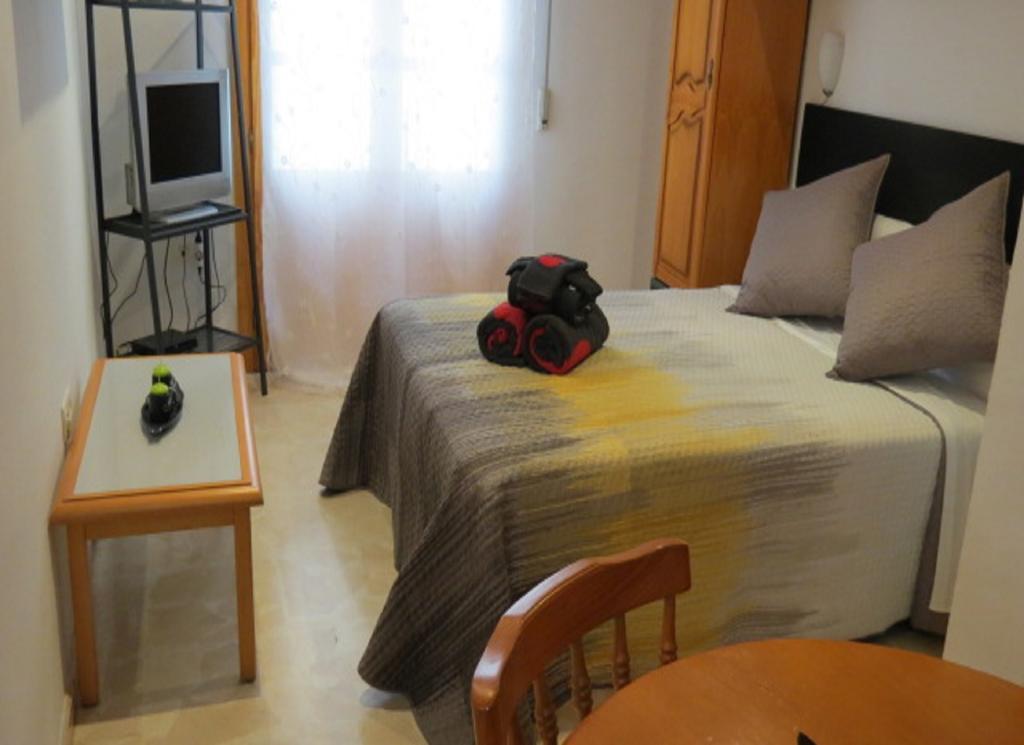 Comet Suites Elvira Granada Habitación foto