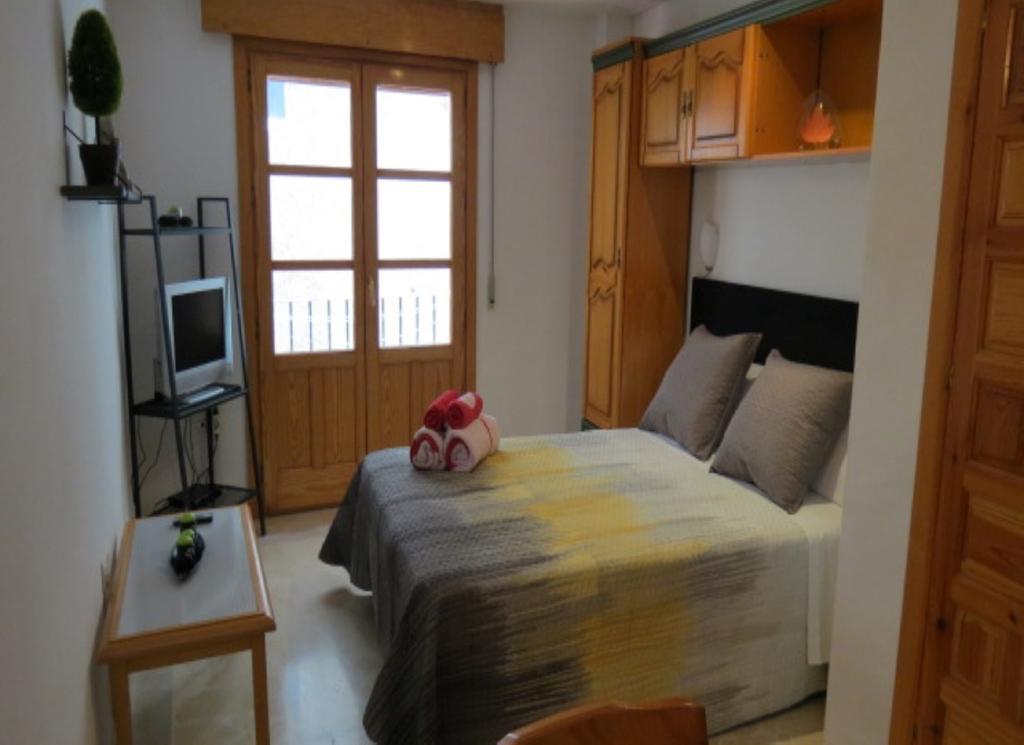 Comet Suites Elvira Granada Habitación foto